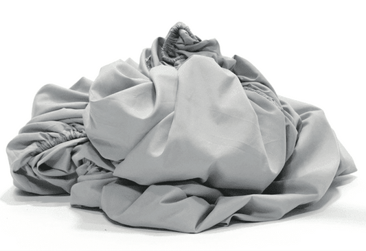 The Easiest Way to Fold a Fitted Sheet - Bare Home