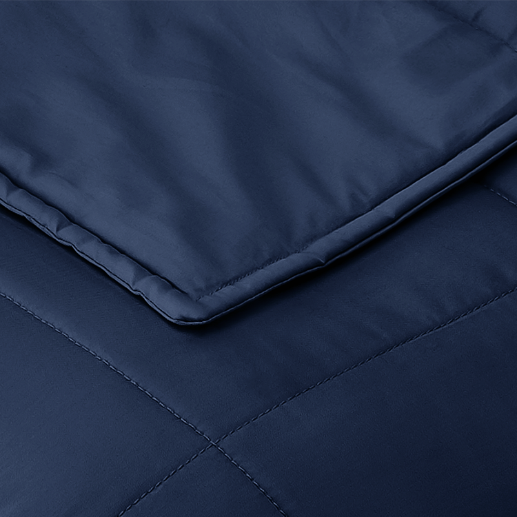 Close-up of navy weighted blanket fabric