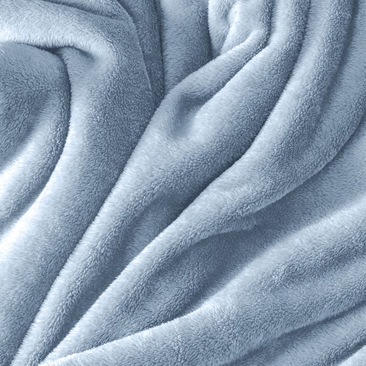 Closeup of light blue Microplush Blanket fabric texture with plush folds