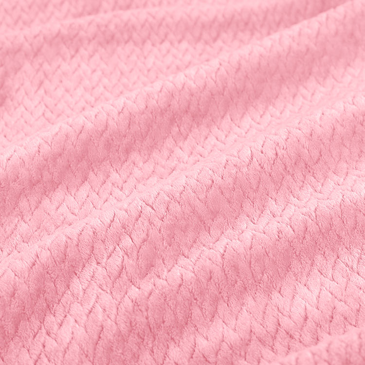 Closeup of pink Microplush Chevron Blanket fabric texture