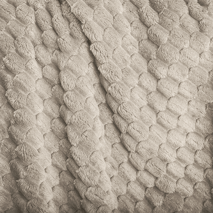 Closeup of cream Microplush Waffle Blanket fabric texture