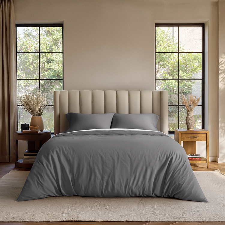 Bed styled with gray Organic Cotton Jersey Duvet Cover Pillowcase Set in a bedroom
