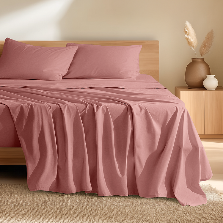 Bed styled with pink Organic Cotton Percale Sheet Set