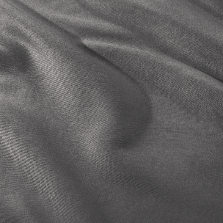 Closeup of dark gray Organic Cotton Sateen Pillowcase Set fabric texture