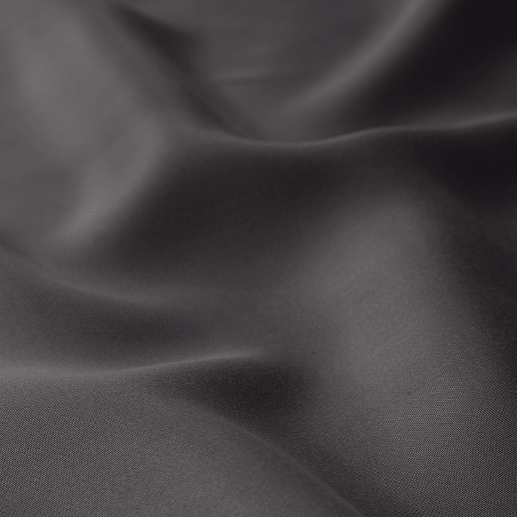 Closeup of dark gray TENCEL Bedding Bundle fabric texture