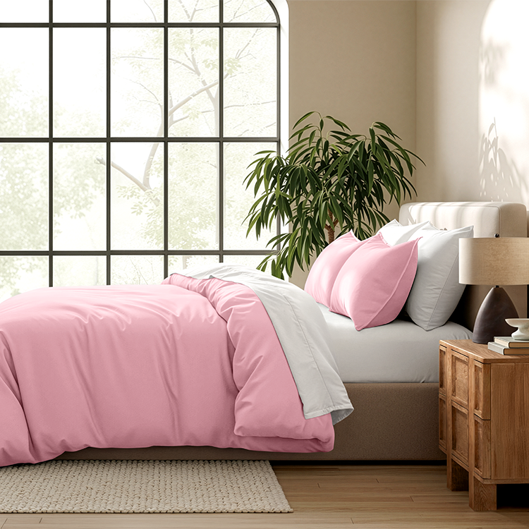 Bed with pink Ultra Soft Duvet Cover Set in a bedroom with window