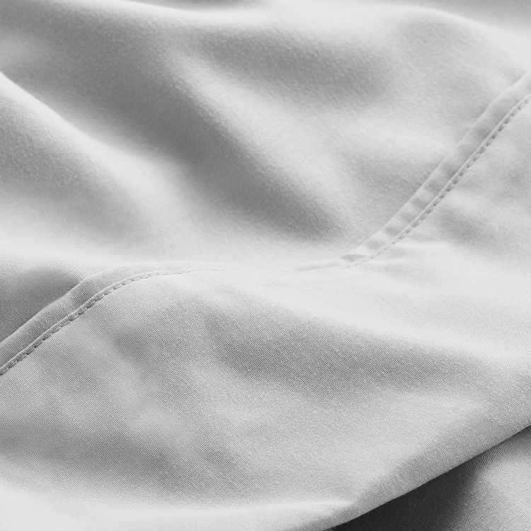 Closeup of white Stretch Knit Sheet Set fabric texture