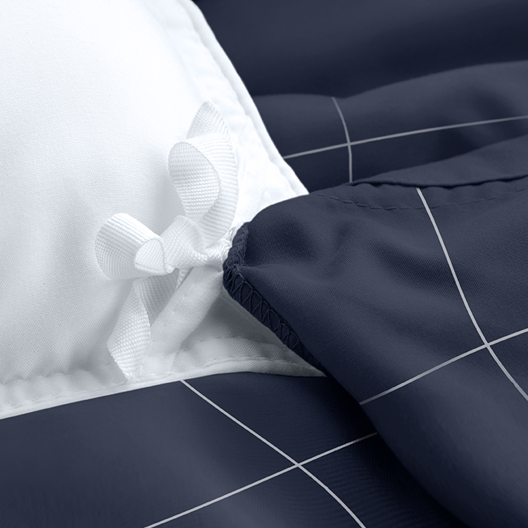 Closeup of navy diamond-quilted Ultra Soft Prints Duvet Cover Set fabric
