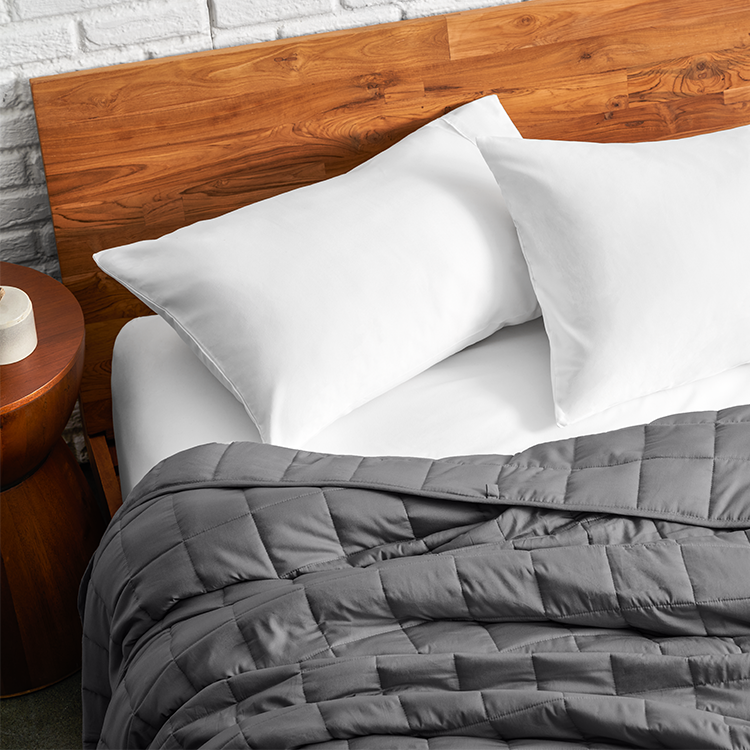 Close-up of white quilted weighted blanket texture