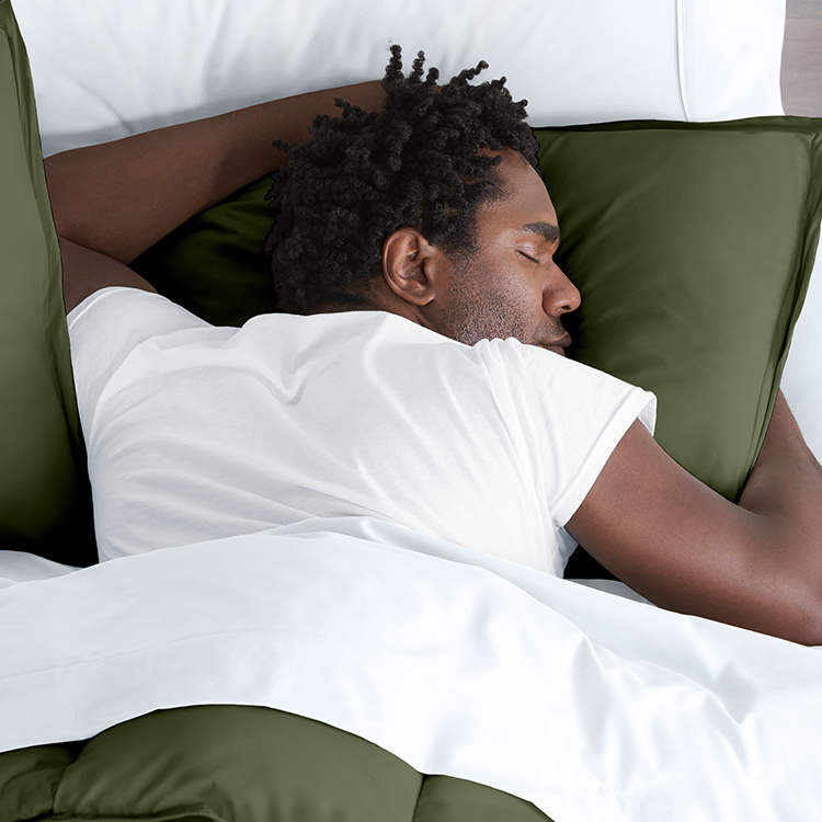 Man sleeping on a white Ultra Soft Pillow Sham Set