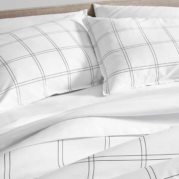Line drawing illustration of a bed styled with Ultra Soft Prints Duvet Cover Set