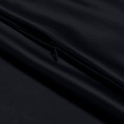 Close-up of a satin pillowcase with a zipper