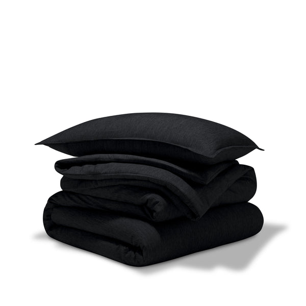 Comforter set stacked on a white background