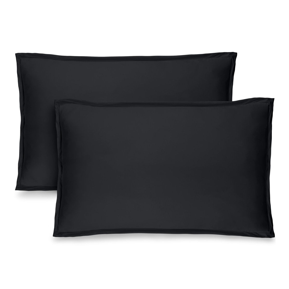 Two microfiber pillow shams on a white background