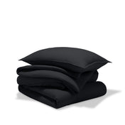 A comforter set folded and stacked
