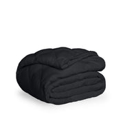 A black quilted mattress pad