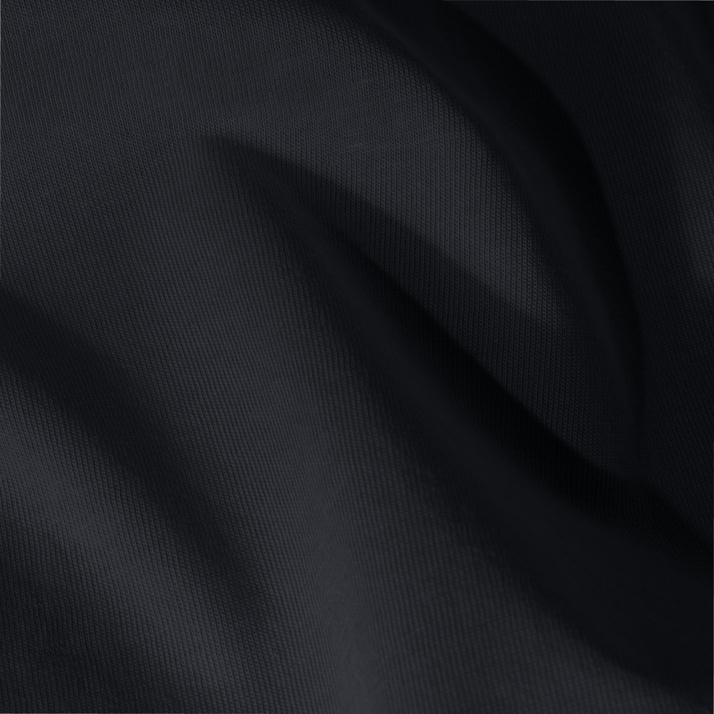 Close-up of jersey fitted sheet fabric with visible texture