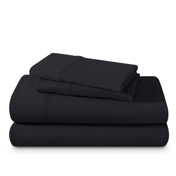 Organic jersey sheet set folded and stacked