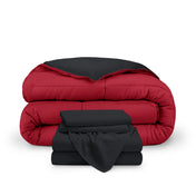 A reversible microfiber comforter and a coordinating sheet set folded and stacked