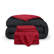 A reversible microfiber comforter and a coordinating sheet set folded and stacked