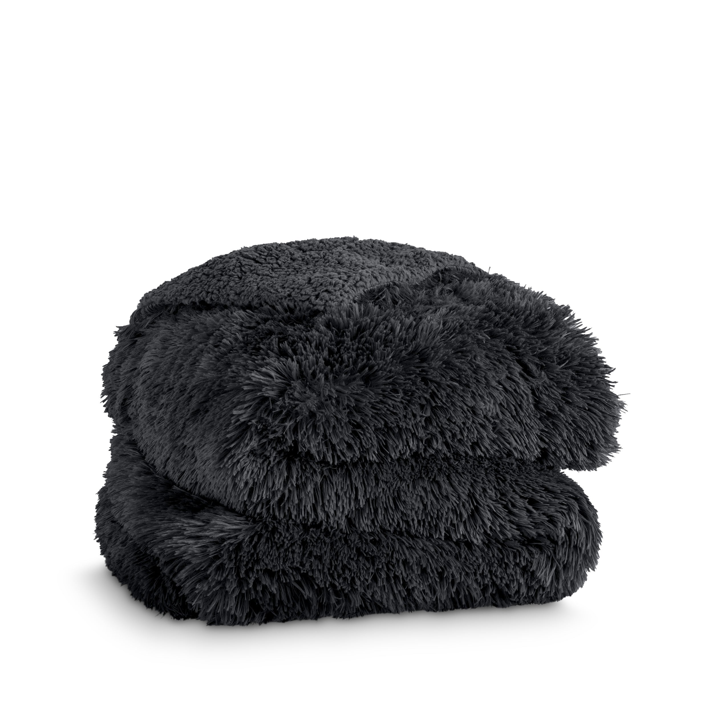 A shaggy faux fur blanket folded