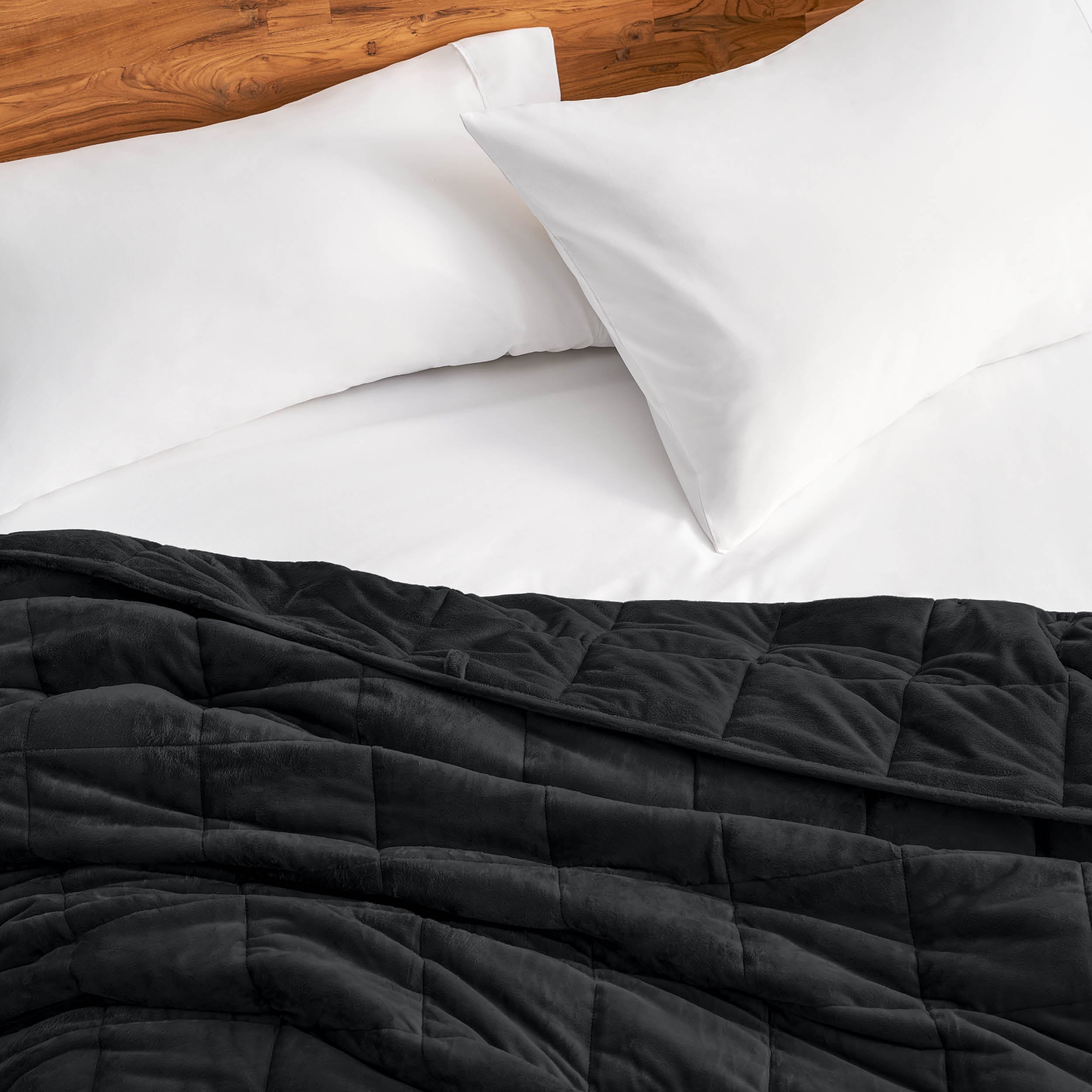 Close-up of a minky weighted blanket on a bed