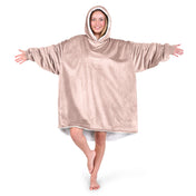 An adult with a sherpa wearable blanket on
