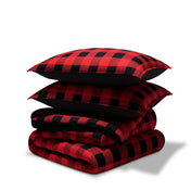 A printed comforter set folded and stacked