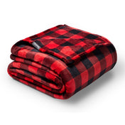 Folded red and black checkered blanket on a white background