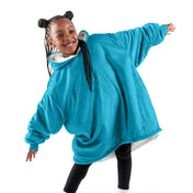 A child with a wearable blanket on