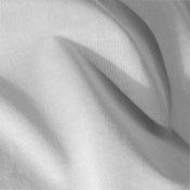 Close-up of jersey fitted sheet fabric with visible texture