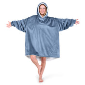 An adult with a sherpa wearable blanket on