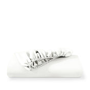 Microfiber fitted sheet folded with a white background