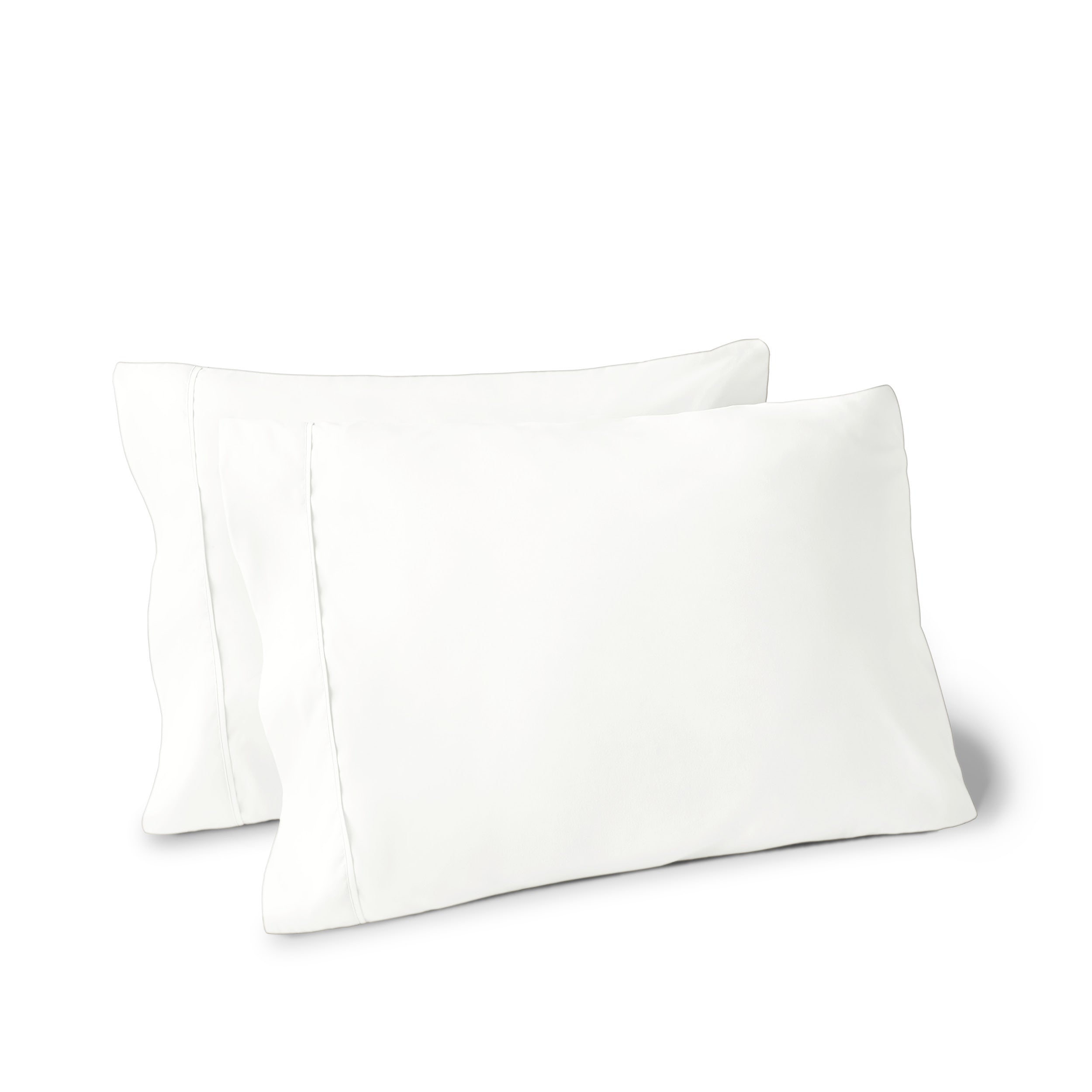 Two pillows on a white background with pillowcases on them