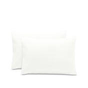 2 pillowcases on pillows