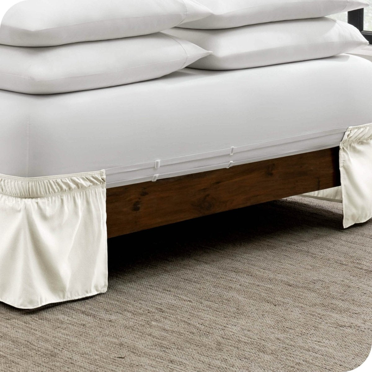The adjustable elastic bands on a bed skirt