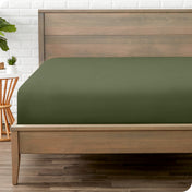 A mattress with just a fitted sheet on it