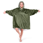 An adult with a sherpa wearable blanket on
