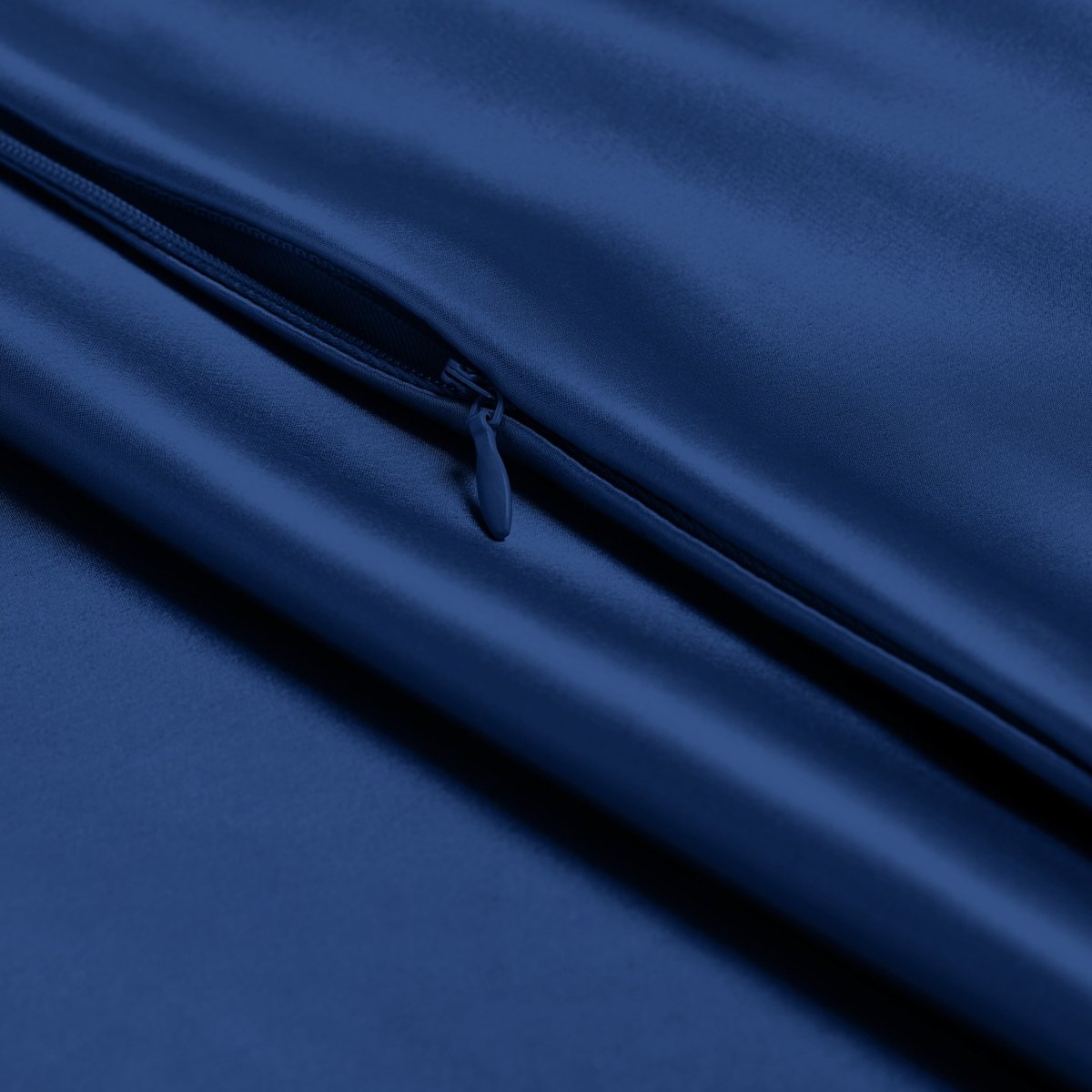 Close-up of a satin pillowcase with a zipper