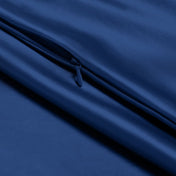 Close-up of a satin pillowcase with a zipper