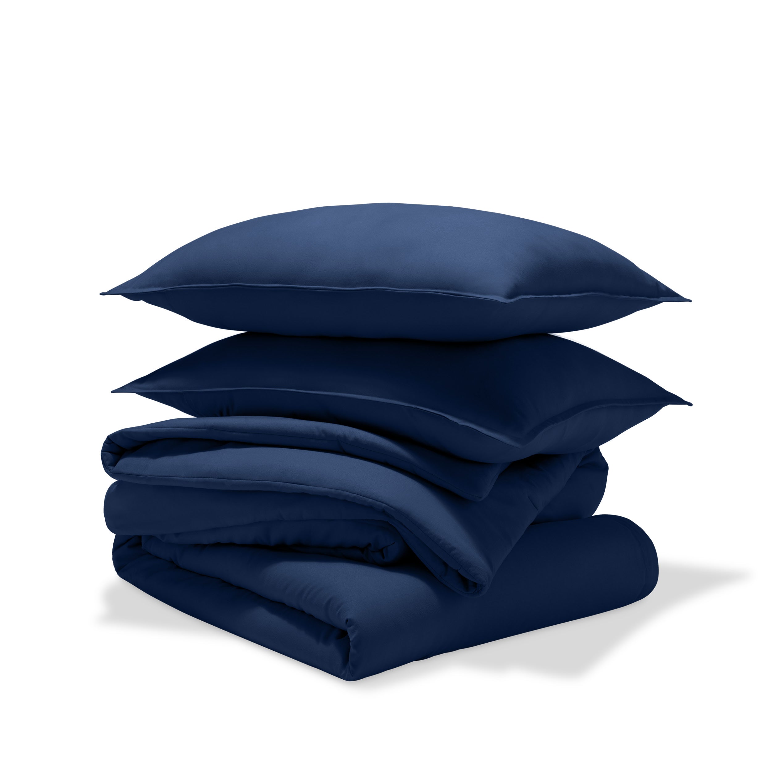 A comforter set folded and stacked