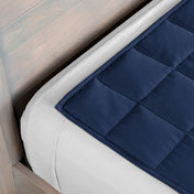 Close-up of a weighted blanket on a bed