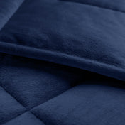 Close-up of a weighted blanket showing the stitching and texture