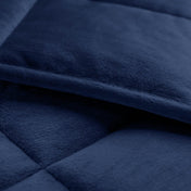 Close-up of a weighted blanket showing the stitching and texture