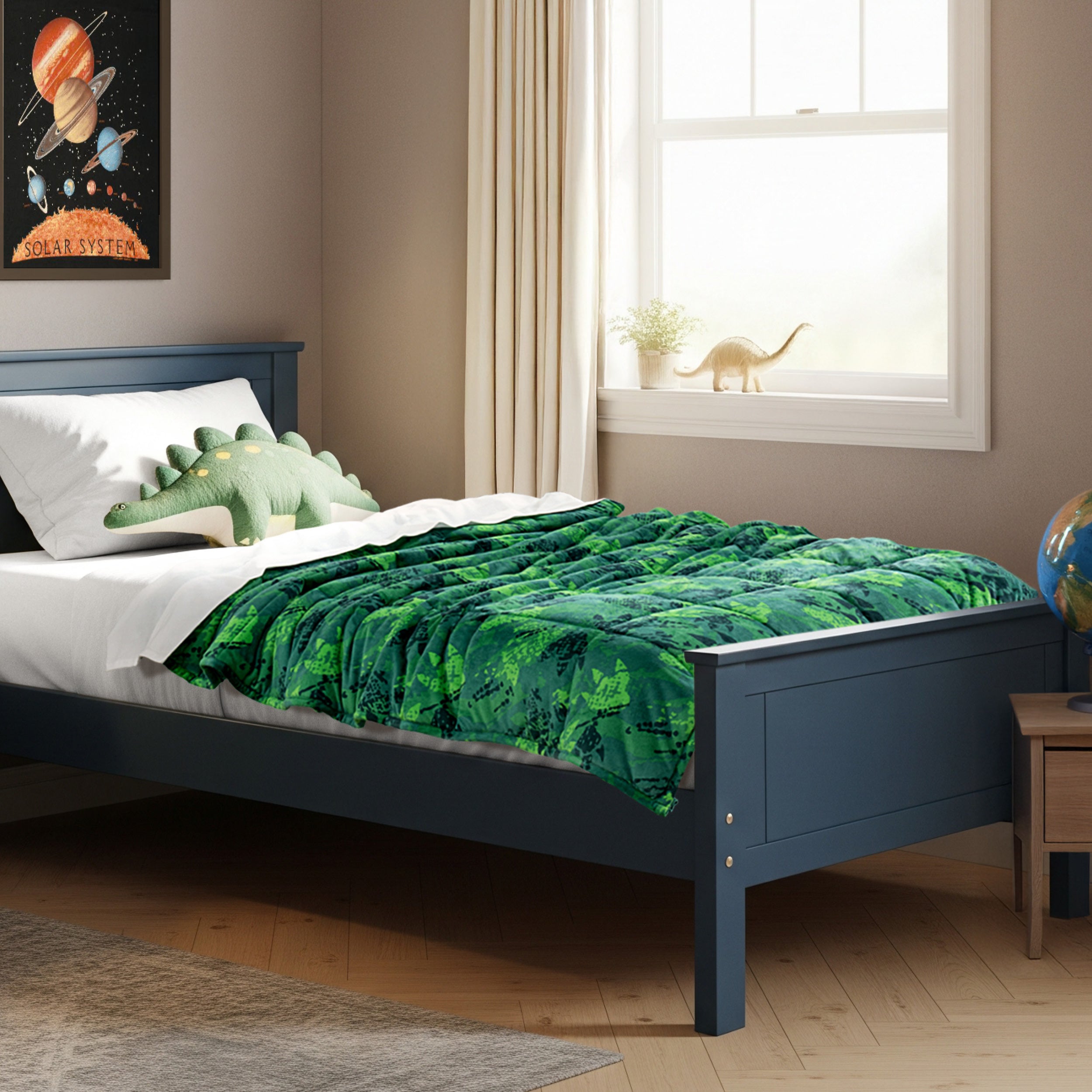 A weighted blanket laid out on a bed.
