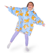 A child wearing a hooded blanket