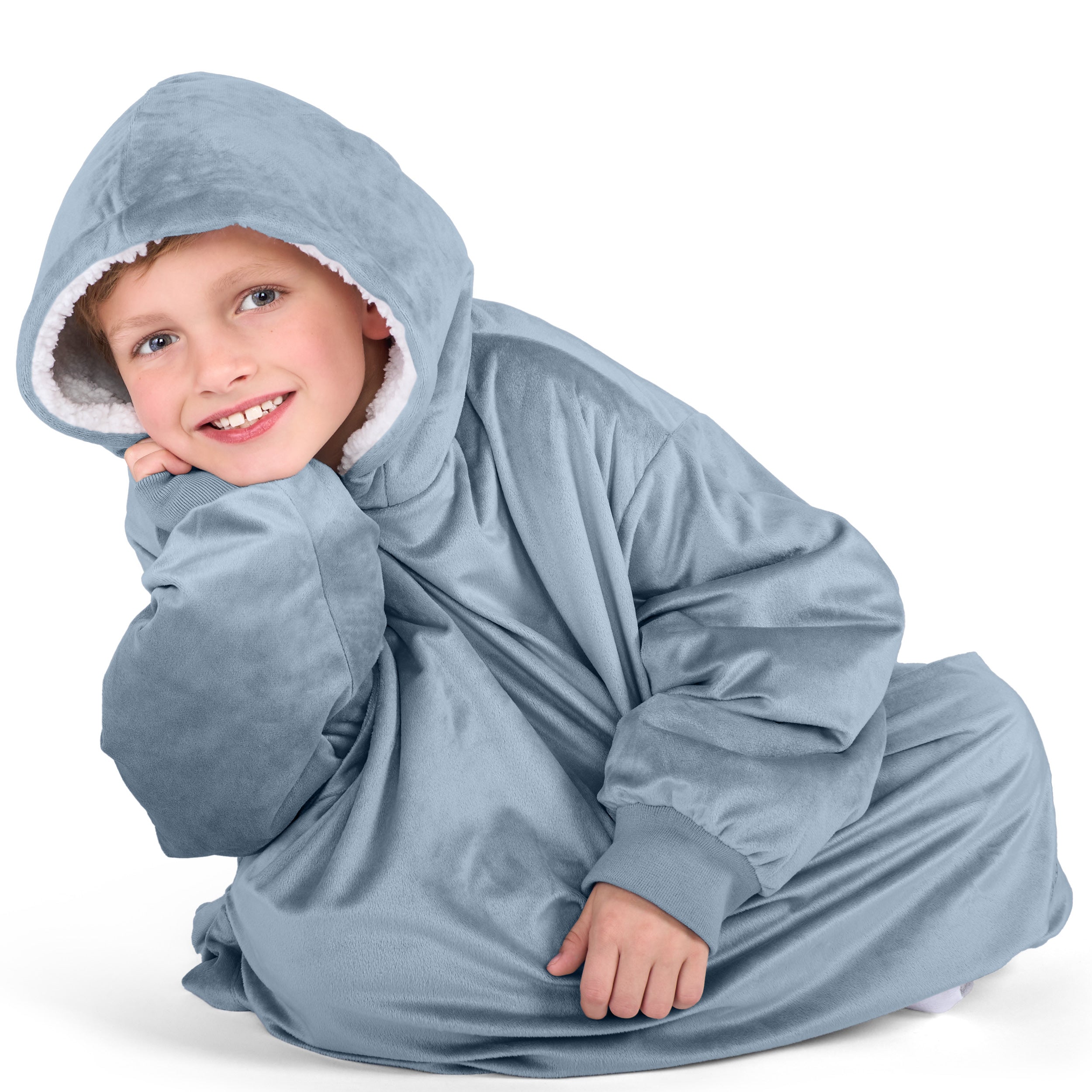 Close up of a sherpa wearable blanket on a child