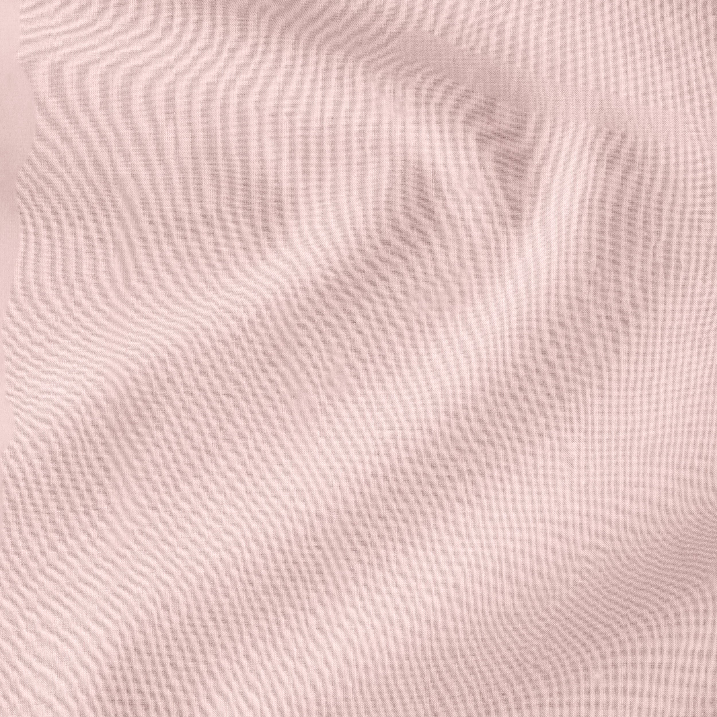 Close up of the fabric of a percale fitted sheet