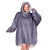 An adult with a sherpa wearable blanket on