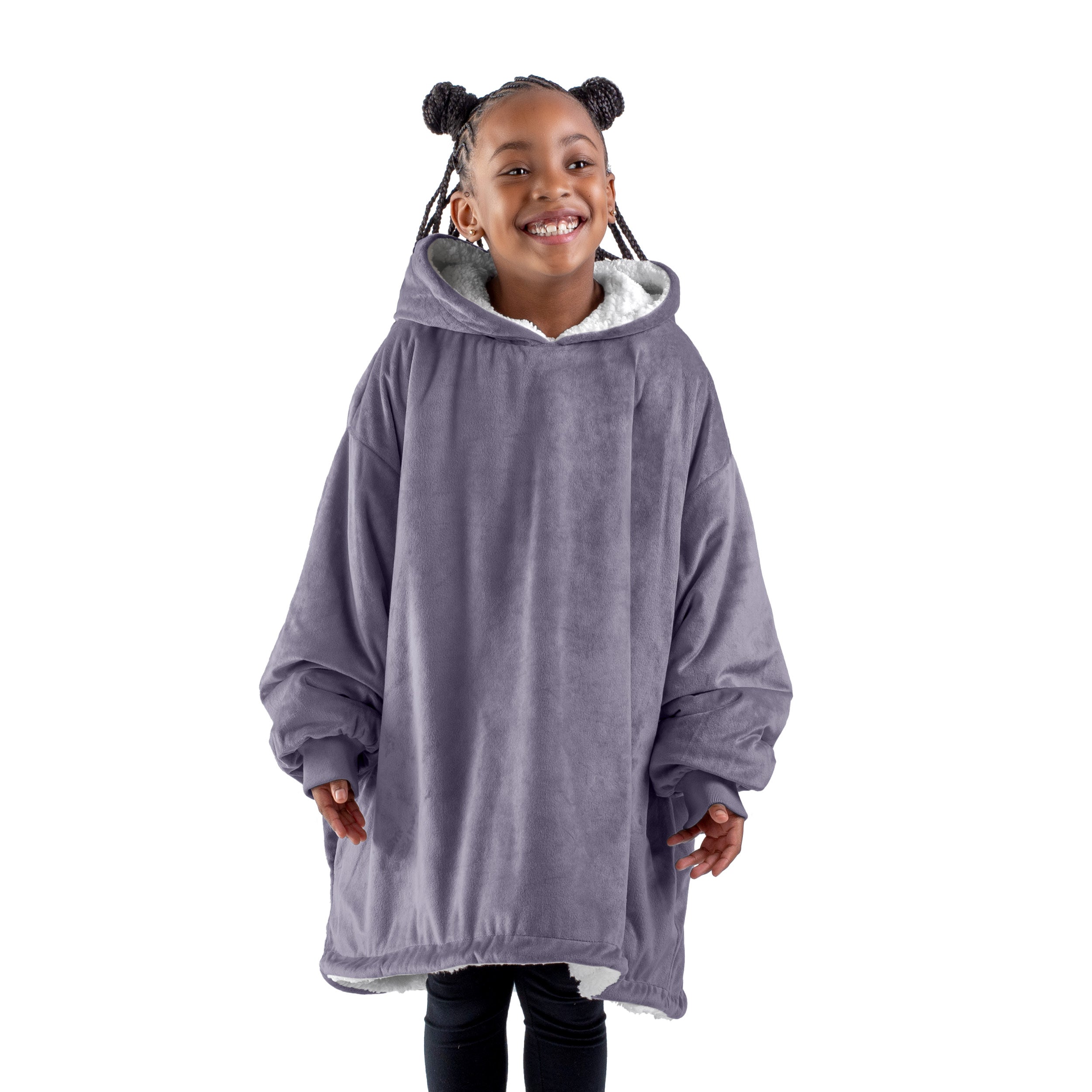 A child with a sherpa wearable blanket on
